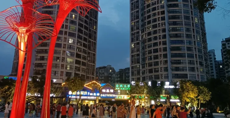 城市建筑夜景四明西路江南华都居民娱乐广场舞