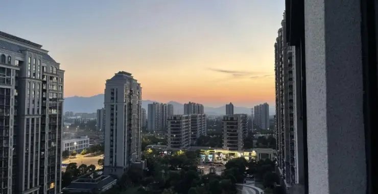 小区夜景高楼落日晚霞朝霞日出楼房