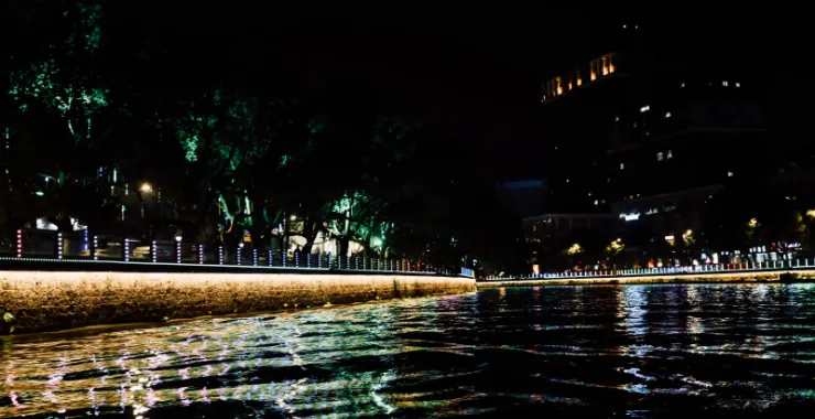 姚江夜景灯光轮渡江边建筑高楼楼房夜晚游船桥